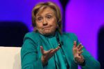 Hillary Shrugging